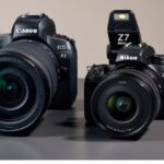 Ojay_Lens is a side-by-side comparison of two mirrorless cameras: the Canon EOS R3 on the left and the Nikon Z7 on the right, both with lenses attached.